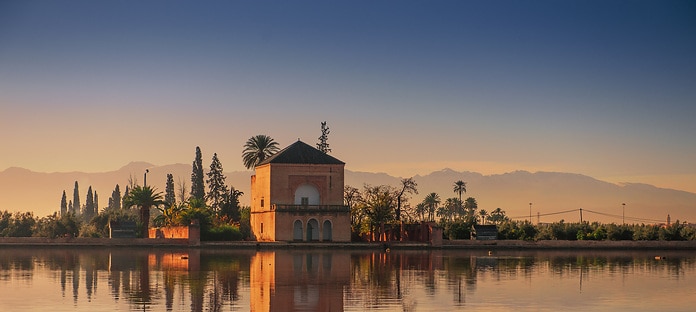 The Menara gardens are gardens located to the west of Marrakech, Morocco, at the gates of the Atlas mountains. They were established in the 12th century (c. 1130) by the Almohad ruler Abd al-Mu'min