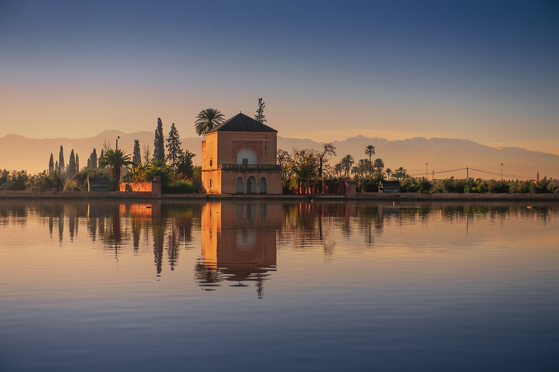 The Menara gardens are gardens located to the west of Marrakech, Morocco, at the gates of the Atlas mountains. They were established in the 12th century (c. 1130) by the Almohad ruler Abd al-Mu'min