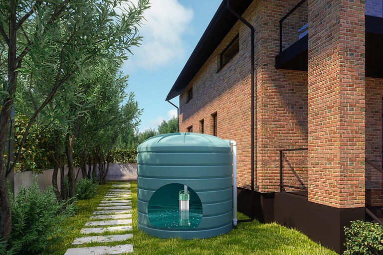 Close-up View Of Rainwater Tank And Villa Exterior