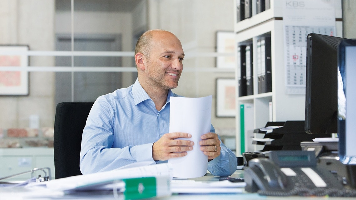 Consultant Marc working in the office