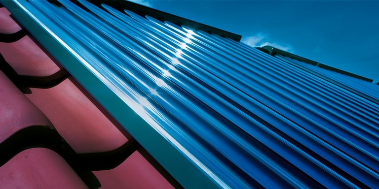Roof of a house with solar panels for solar heating