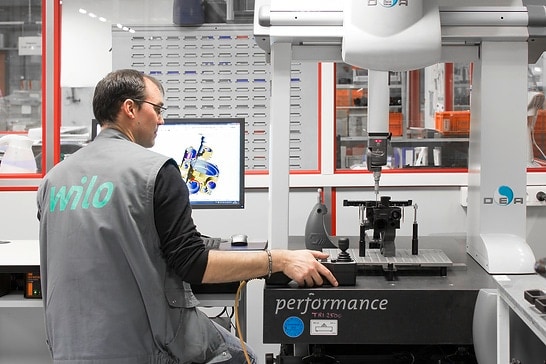 Wilo's OEM division is based in Aubigny, France, with 500 employees. Picture shows a man, performing a test in the lab.