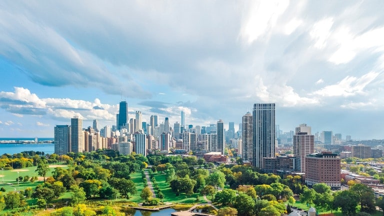 Chicago skyline aerial drone view from above, lake Michigan and city of Chicago downtown skyscrapers cityscape from Lincoln park, Illinois, USA