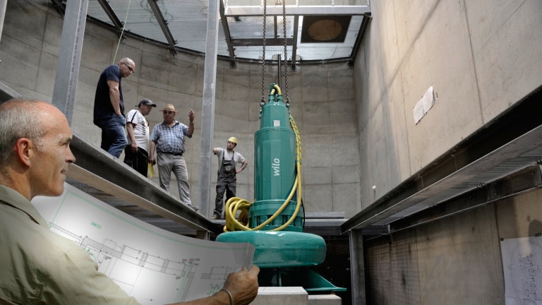 Water management consultants in a new wastewater collection and transport pumping station