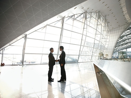 Handshake in entrance hall of the incheon international airport