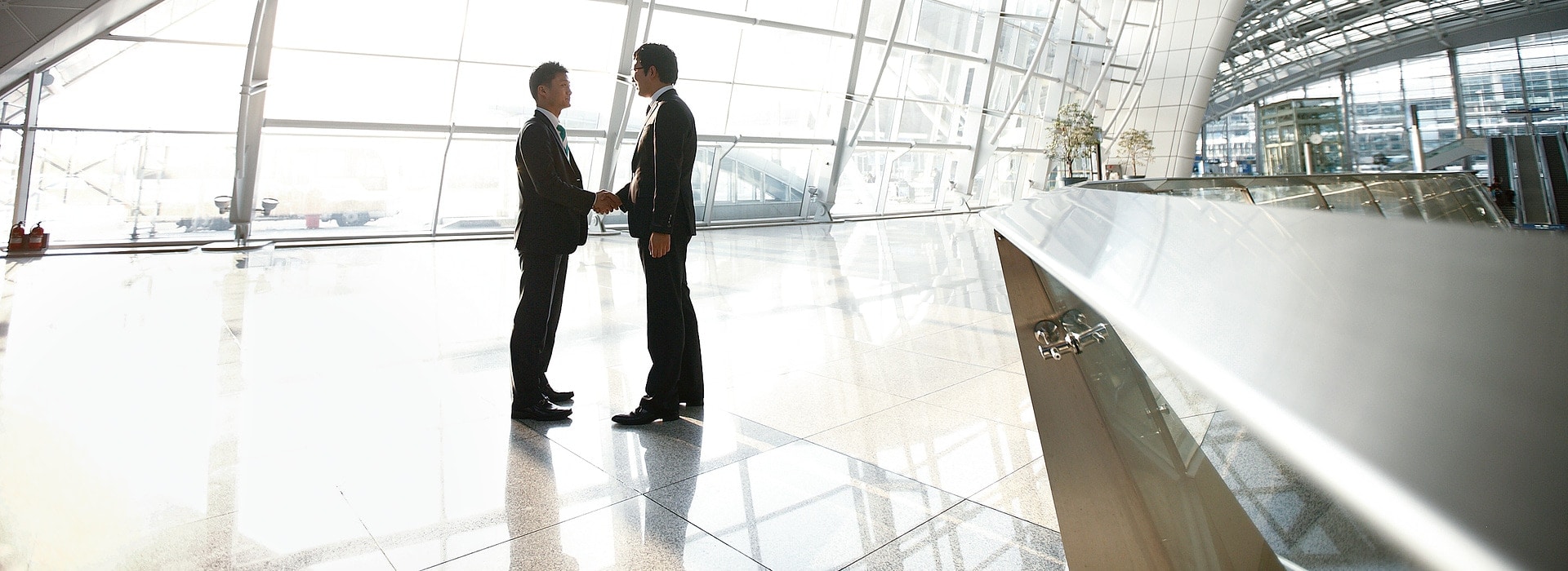 Handshake in entrance hall of the incheon international airport