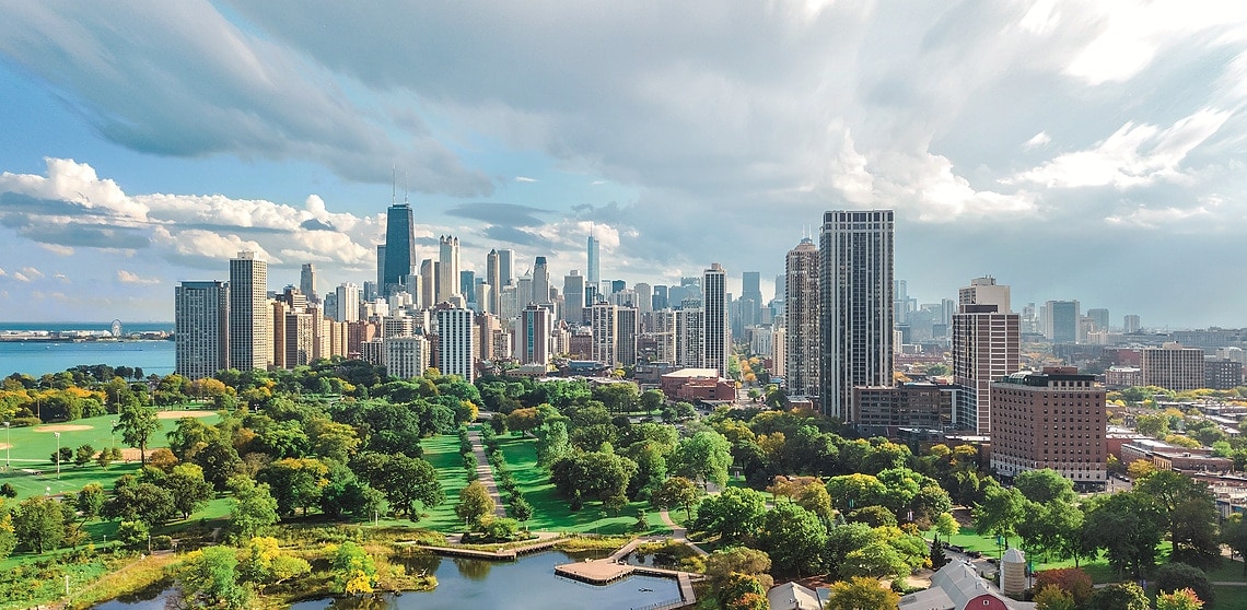 Chicago skyline aerial drone view from above, lake Michigan and city of Chicago downtown skyscrapers cityscape from Lincoln park, Illinois, USA