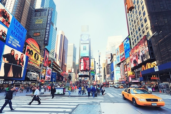 Duffy square in Time Square, New York City. Vintage tones.