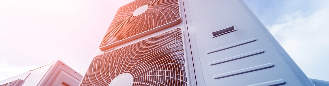Air conditioners on the roof of an industrial building. HVAC. Air conditioners on the roof of an industrial building. HVAC.