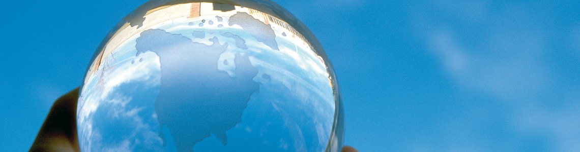 Hand with glass globe