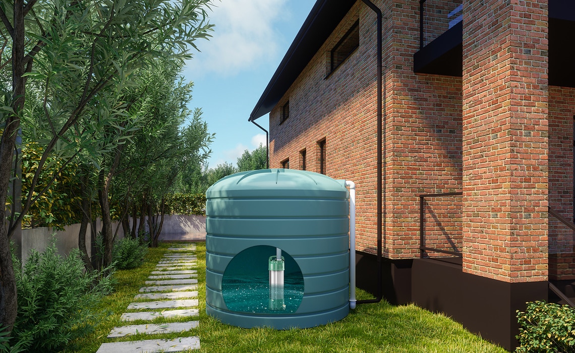 Close-up View Of Rainwater Tank And Villa Exterior