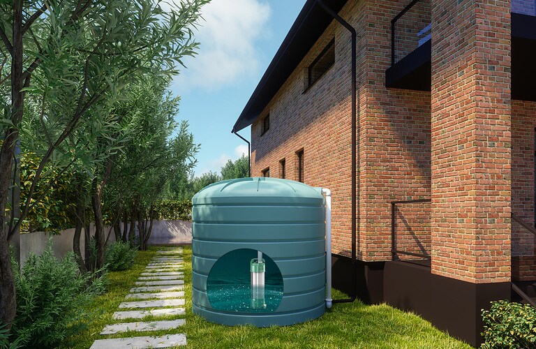 Close-up View Of Rainwater Tank And Villa Exterior
