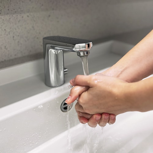 Washing hands at the sink