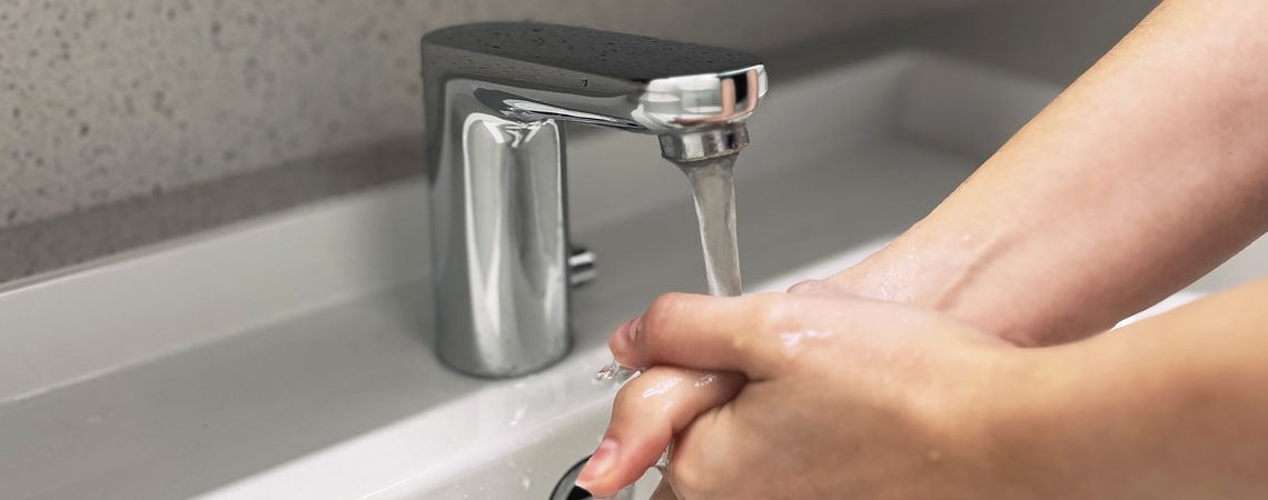 Washing hands at the sink