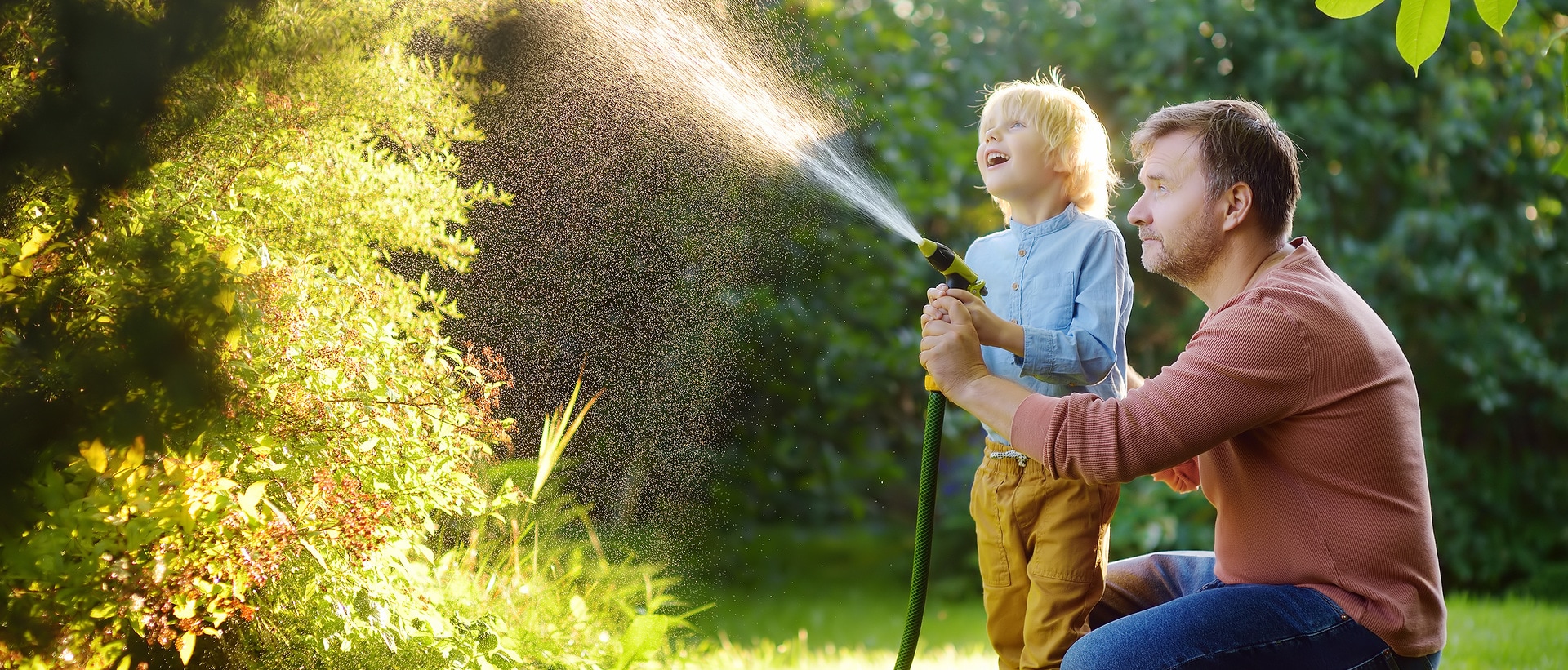 father-and-son-in-the-efficient-use-of-rainwater-for-gardening
