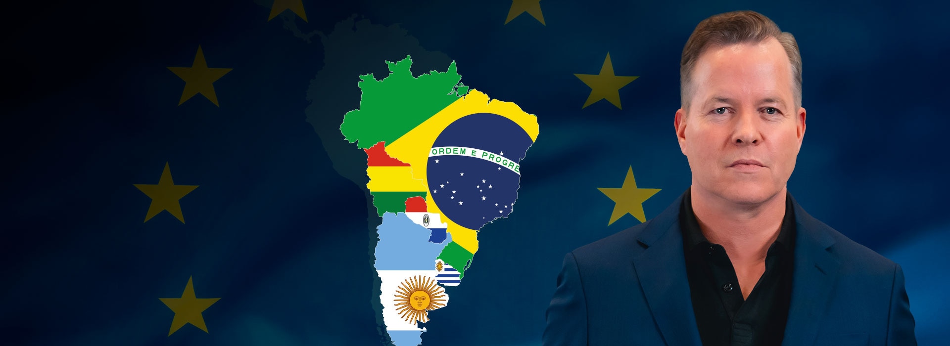 Oliver Hermes in front of the Mercosur states and a flag of Europe