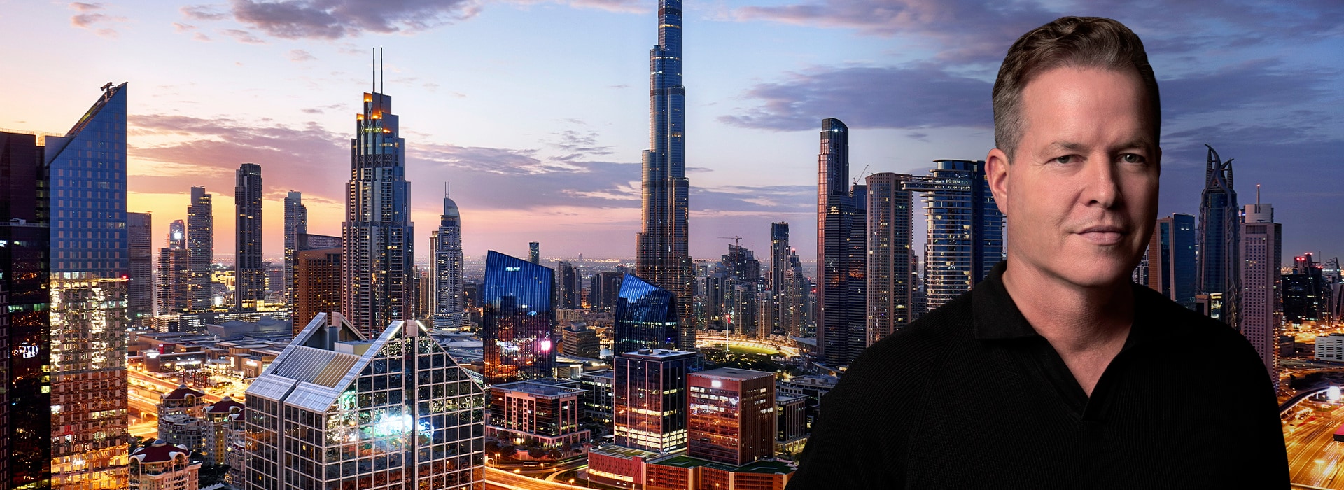 Oliver Hermes in front of the Dubai Skyline