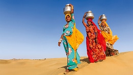 Three women in the desert