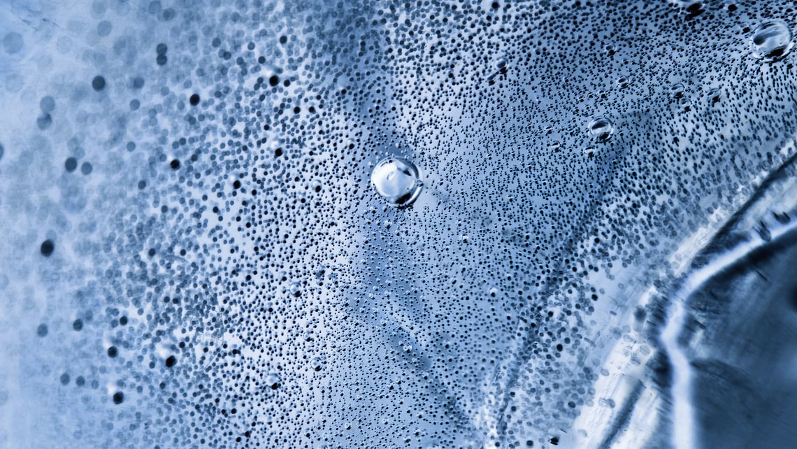 Close-up of water surface as a symbol for trace substance elimination in advanced treatment stages of wastewater treatment plants