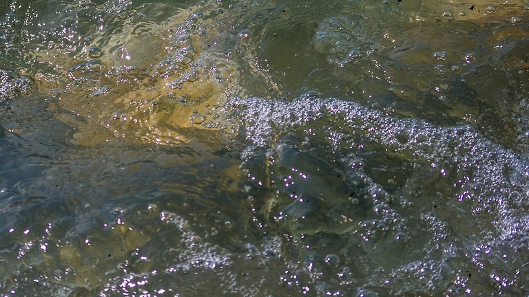 Water surface as a symbol for the monitoring of combined sewer overflows and the protection of water bodies