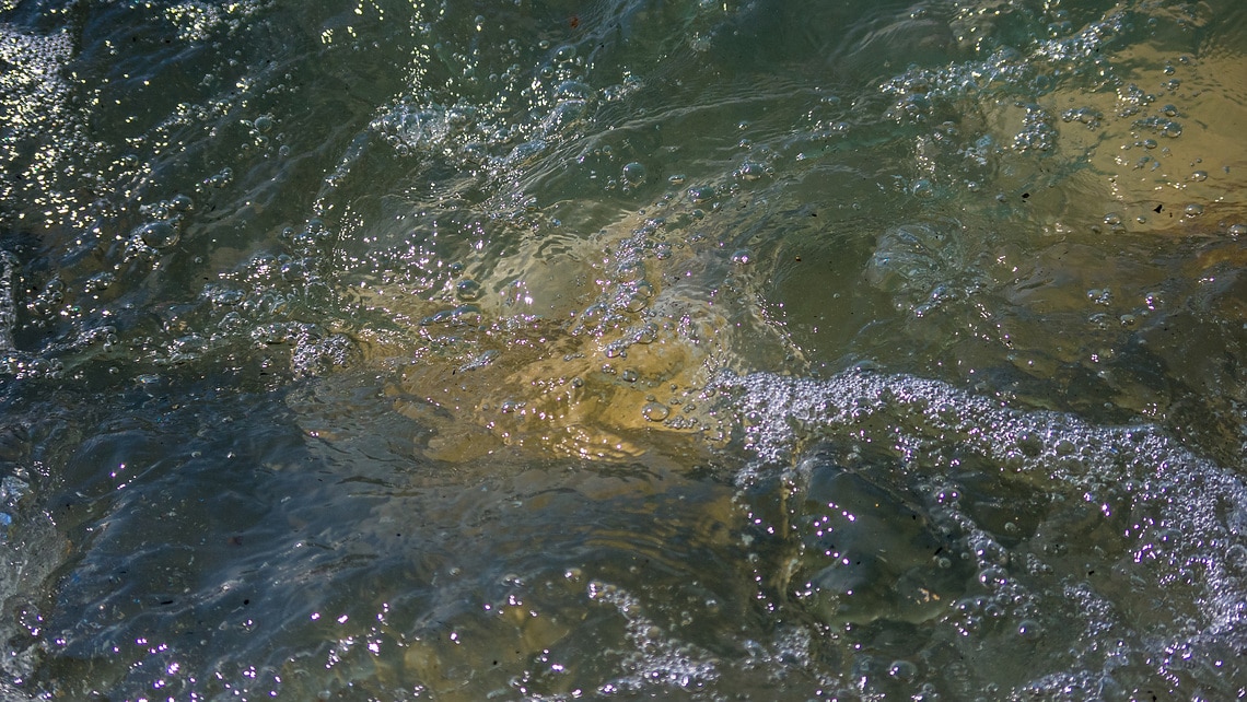 Water surface as a symbol for the monitoring of combined sewer overflows and the protection of water bodies